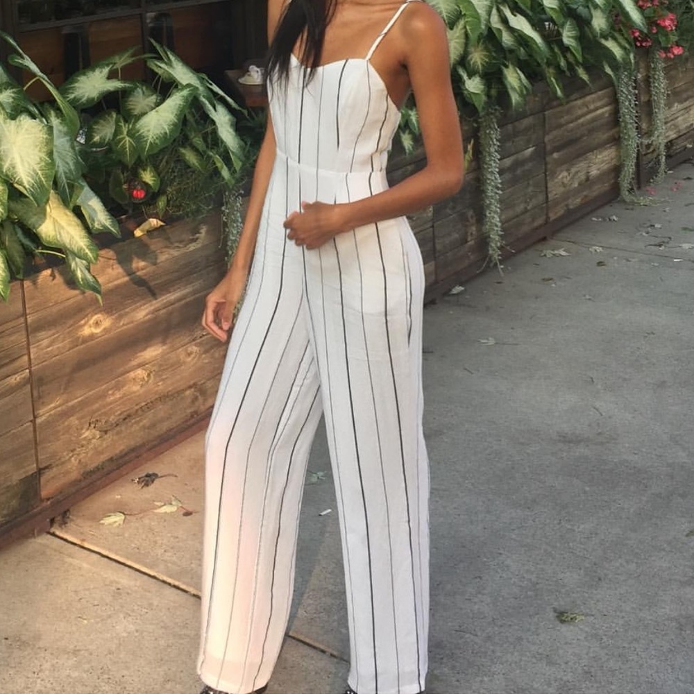 Super cute white jumpsuit!